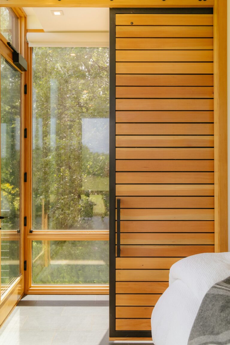 Solid wood front door with horizontal planks and side lights, inspiration for custom doors