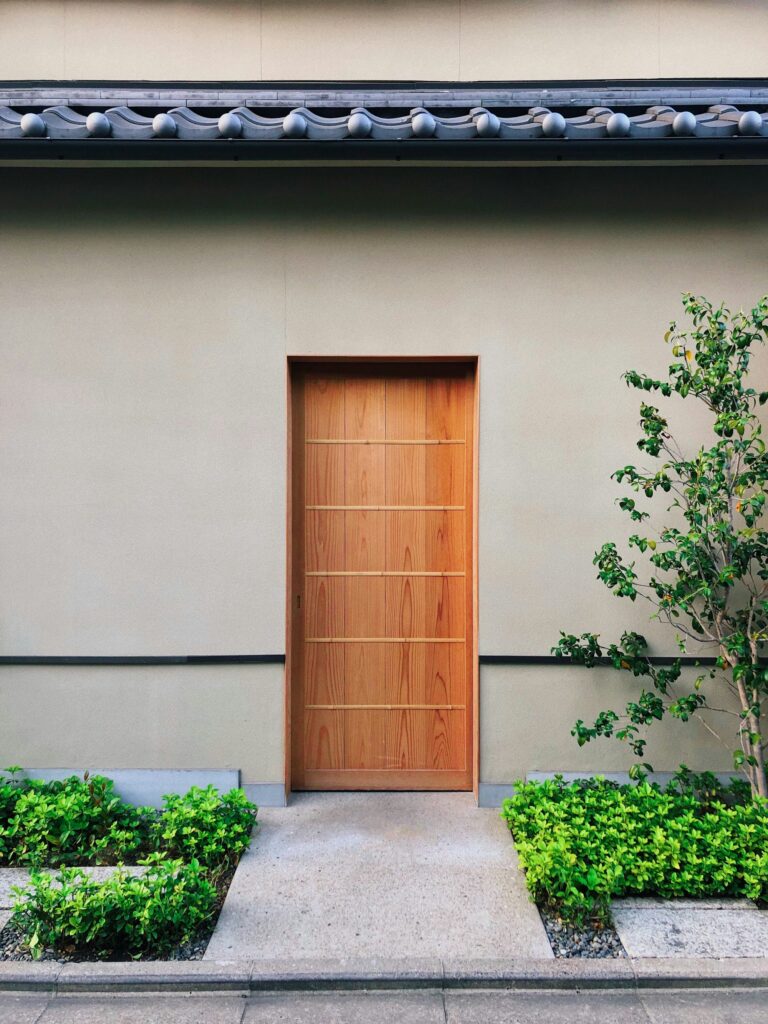 Modern teak front door with horizontal grooves, inspiration for custom doors