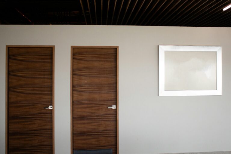 Two interior wood veneer doors with horizontal grain, inspiration for custom doors