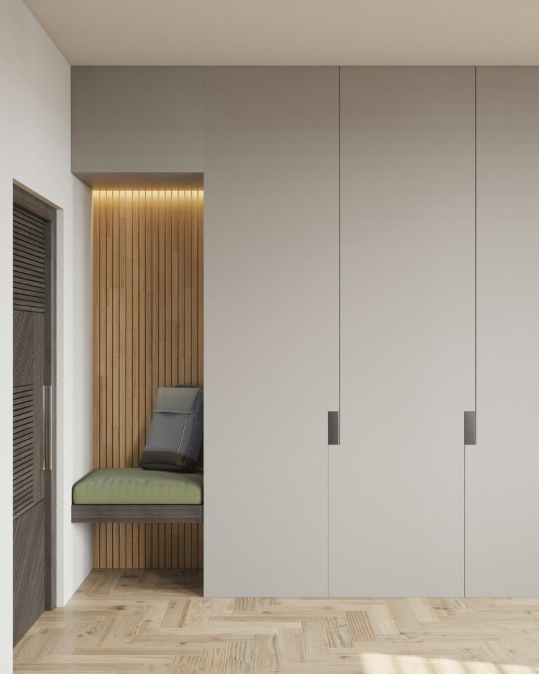 Built in wardrobes with seating niche and slats in a hallway, inspiration for custom wardrobes