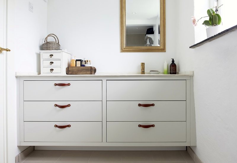 Bathroom chest of drawers with painted fronts and leather handles